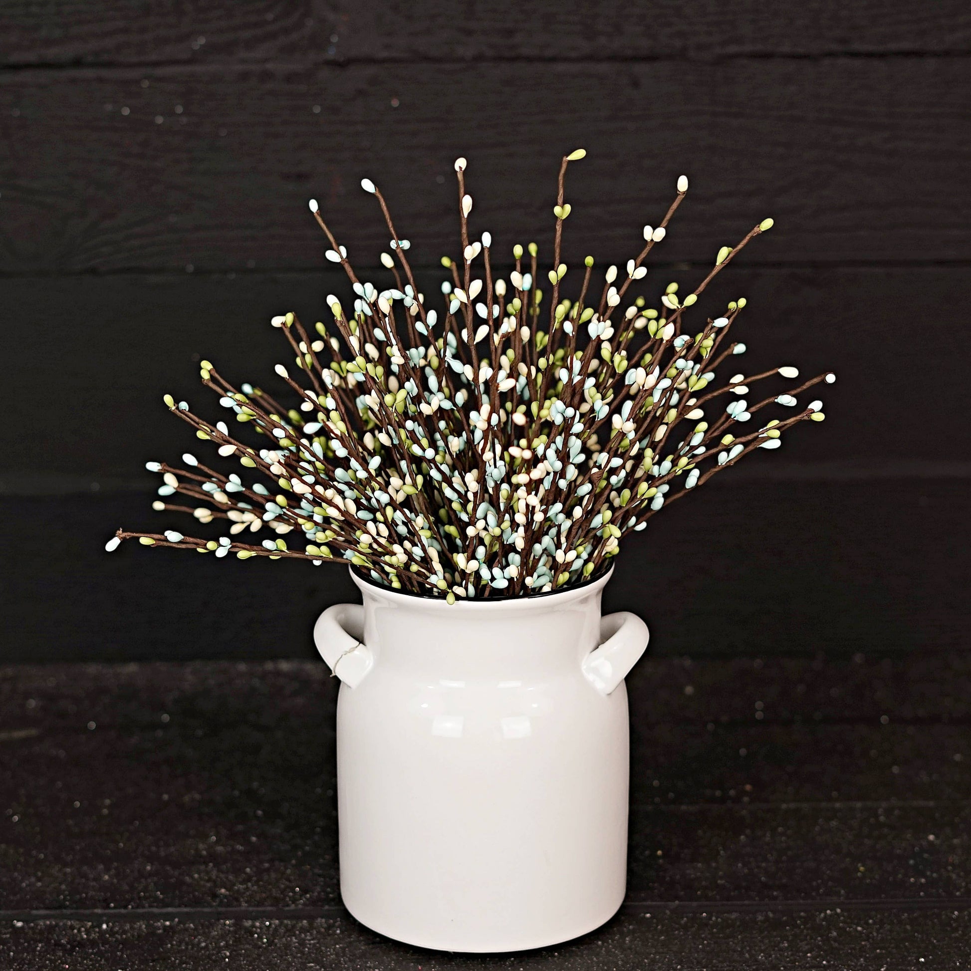 Mellow Monkey 12-inch Seabreeze pip berry pick with blue, green, and white berries on brown stems in a white pitcher.