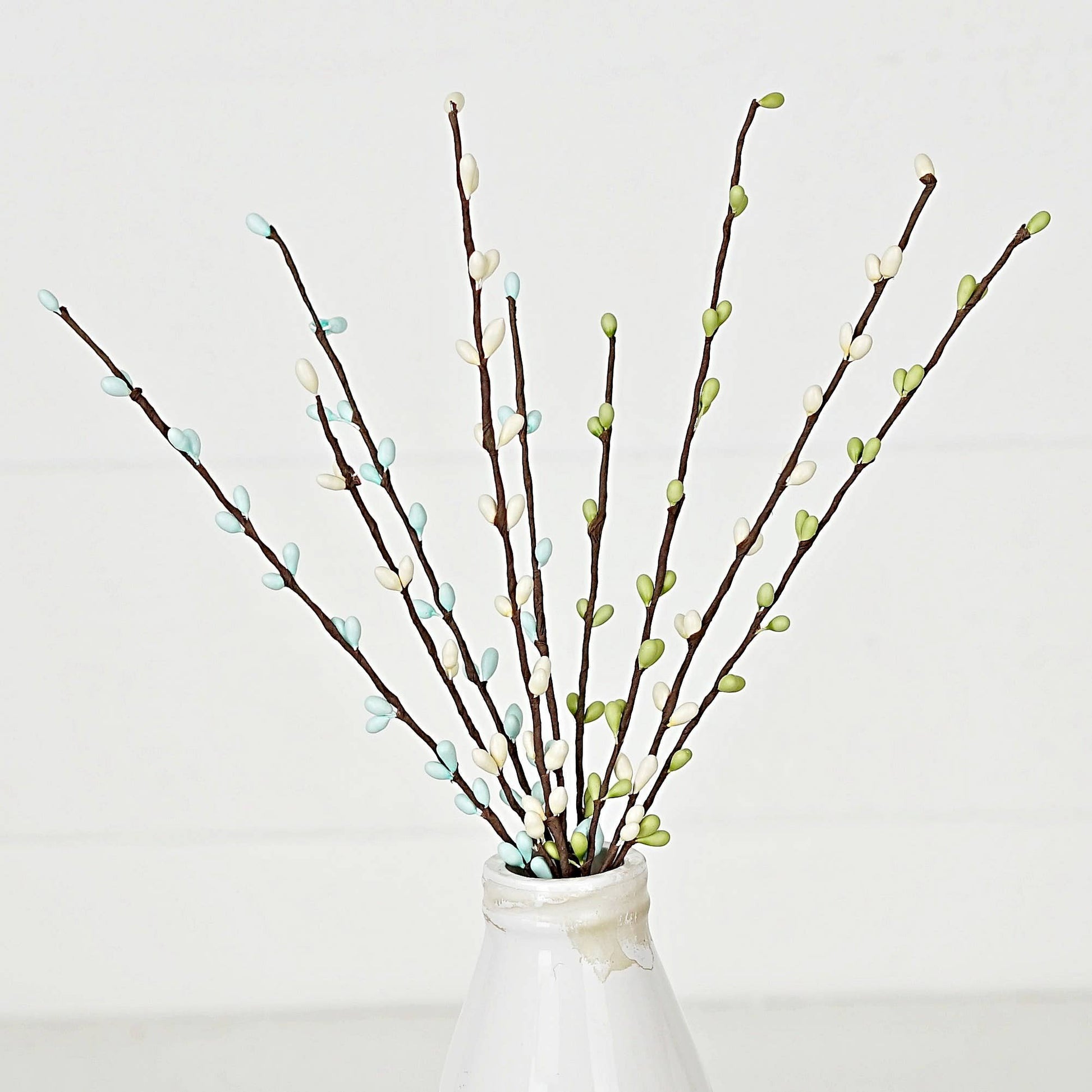 Mellow Monkey 12-inch Seabreeze pip berry pick with blue, green, and white berries on brown stems for spring decor.