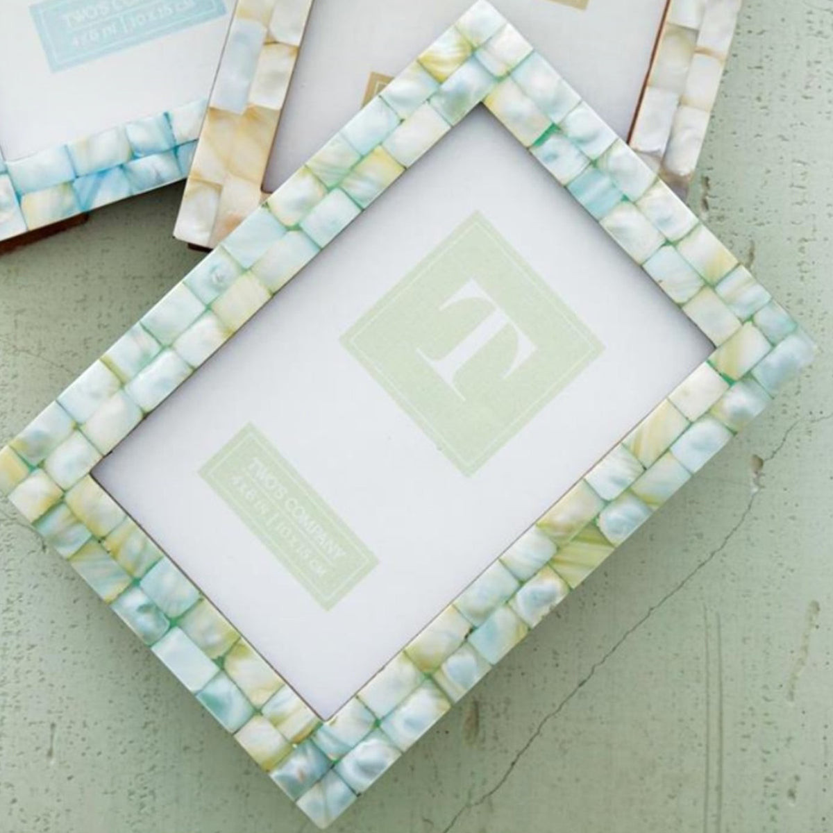 Mellow Monkey 5x7 photo frame featuring iridescent seafoam mother of pearl tiles on a sheesham wood base