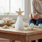 Mellow Monkey 6-inch white seaglass Christmas tree with a real starfish topper on a wooden table with coastal decor.