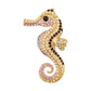 Mellow Monkey gold-tone seahorse brooch pin adorned with purple, black, and iridescent rhinestones.