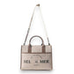 Mellow Monkey Sel de Mer shoulder bag in old mill white up-cycled canvas with brown leather trim and Parisian print.