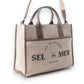 Mellow Monkey Sel de Mer shoulder bag in Old Mill White up-cycled canvas with brown genuine leather trim and handles.