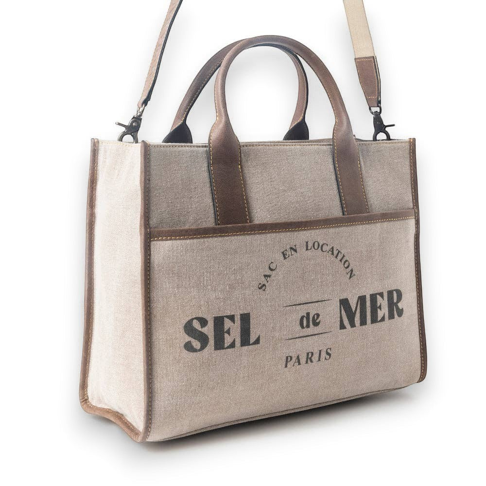 Mellow Monkey Sel de Mer shoulder bag in Old Mill White up-cycled canvas with brown genuine leather trim and handles.