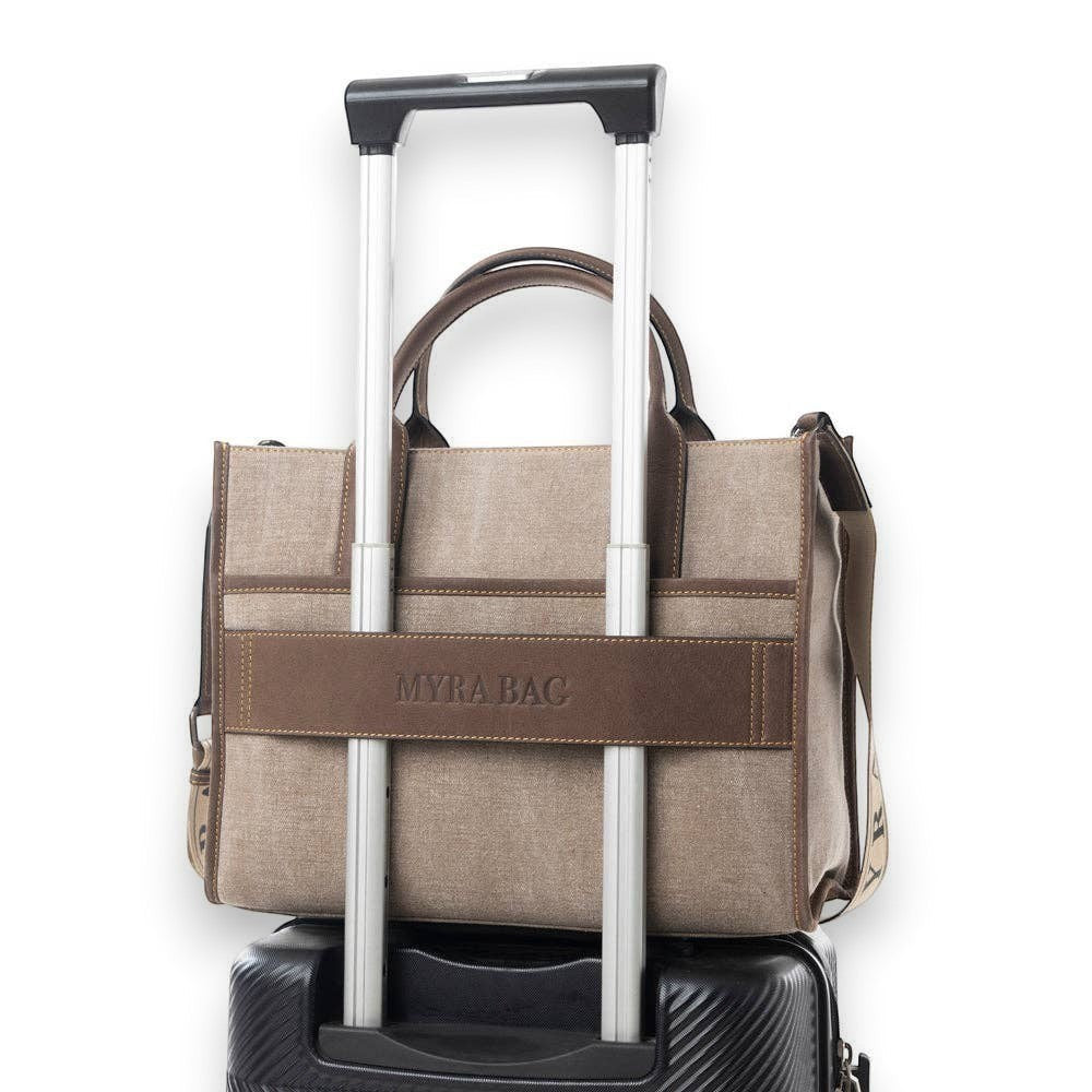 Mellow Monkey Sel de Mer shoulder bag in old mill white up-cycled canvas with genuine leather trim on luggage handle