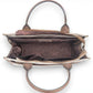 Mellow Monkey Sel de Mer shoulder bag in old mill white, showing the open interior with brown lining and leather trim.