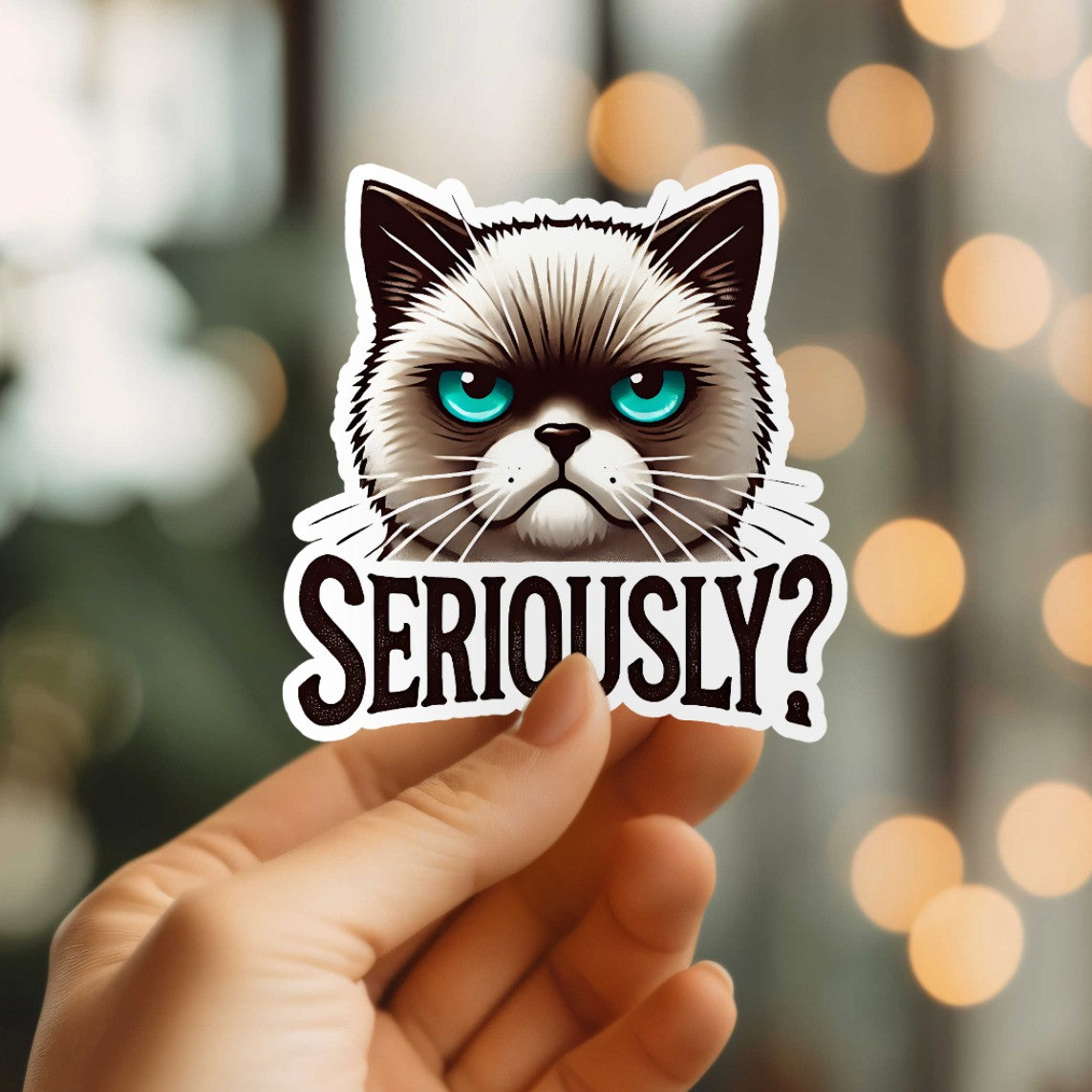 Mellow Monkey Seriously Cat waterproof vinyl sticker held in hand with a grumpy cat illustration and text