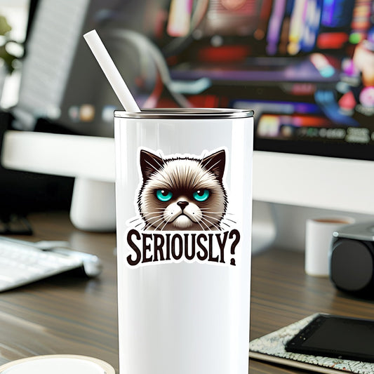 Mellow Monkey Seriously Cat waterproof vinyl sticker applied to a white tumbler on a desk
