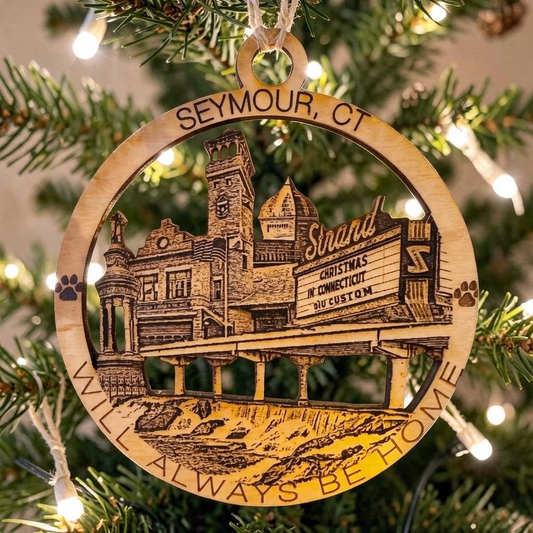 Mellow Monkey 4-inch wood ornament featuring a laser-engraved Seymour, CT town landmark design with burlap string.