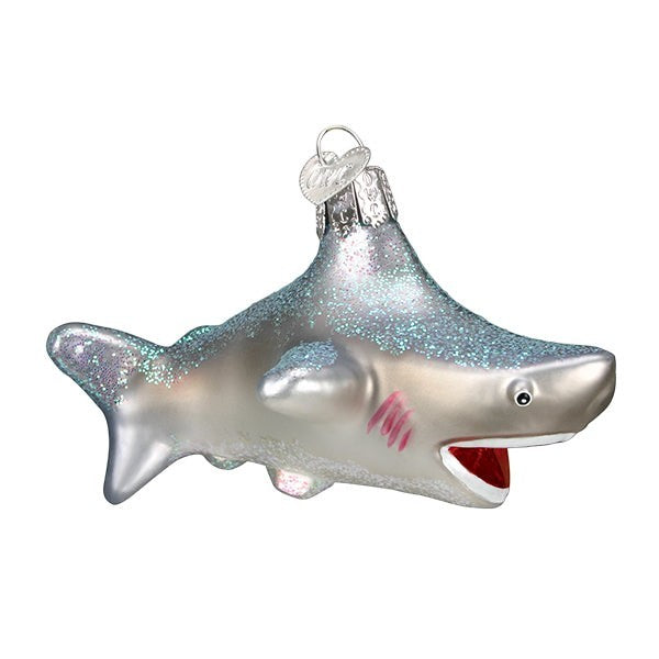 Mellow Monkey Old World Christmas blown glass shark ornament, silver with blue glitter accents and red gills.