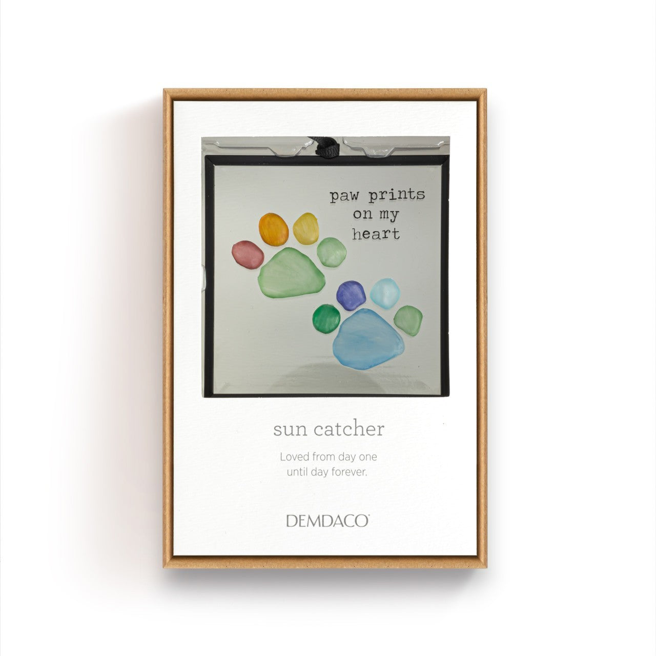 Mellow Monkey Sharon Nowlan suncatcher featuring a rainbow pebble paw print design and the text Paw Prints On My Heart