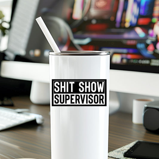 Mellow Monkey Shit Show Supervisor vinyl decal sticker applied to a white stainless steel tumbler on a desk.
