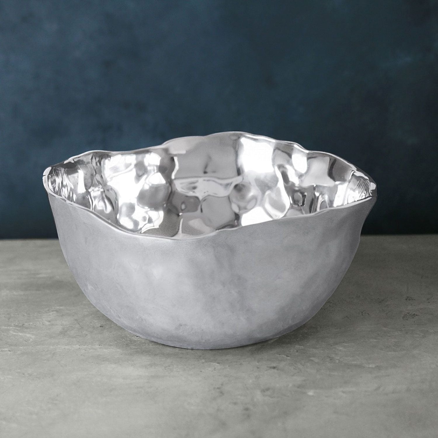 Mellow Monkey SOHO Osaka Medium Deep Bowl in silver aluminum alloy, 11-inch diameter, with a hammered interior and wavy rim.