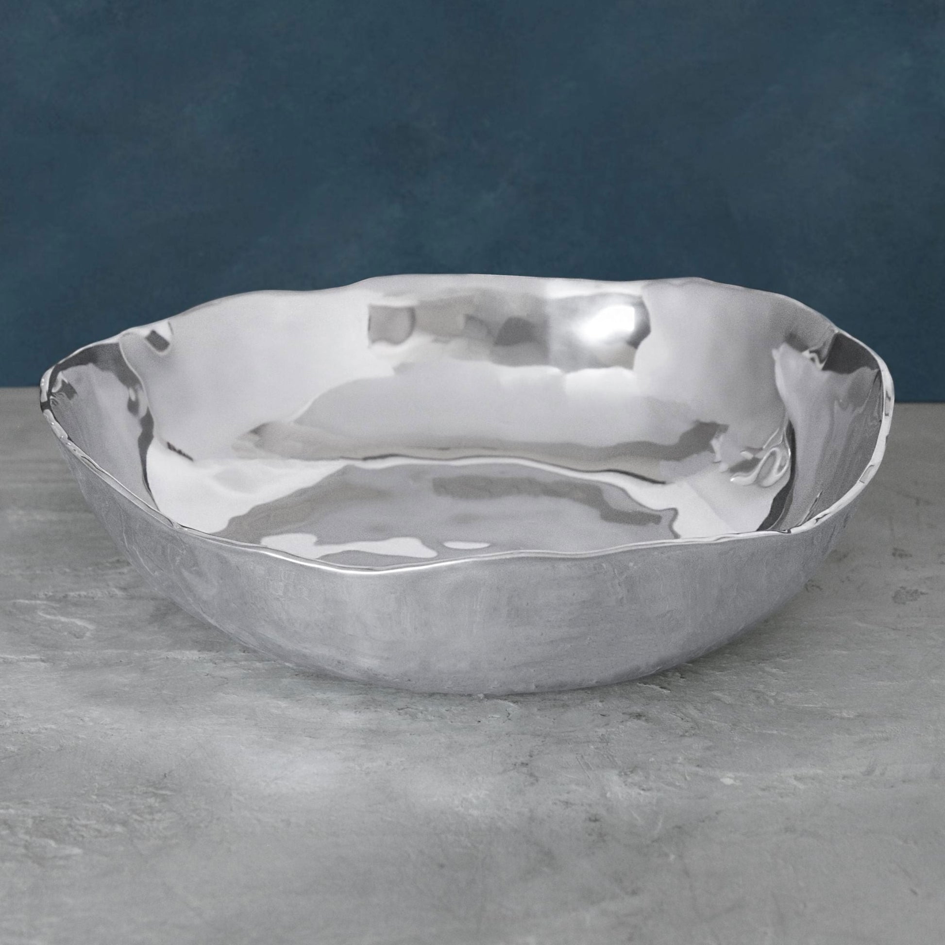 Mellow Monkey SOHO Osaka Large Bowl in silver, made of aluminum alloy. Features a hammered, organic shape perfect for salads or as a centerpiece.