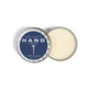 Mellow Monkey Wood Aromatics Silver Birch hand salve in a round metal tin with a blue label and creamy balm inside.