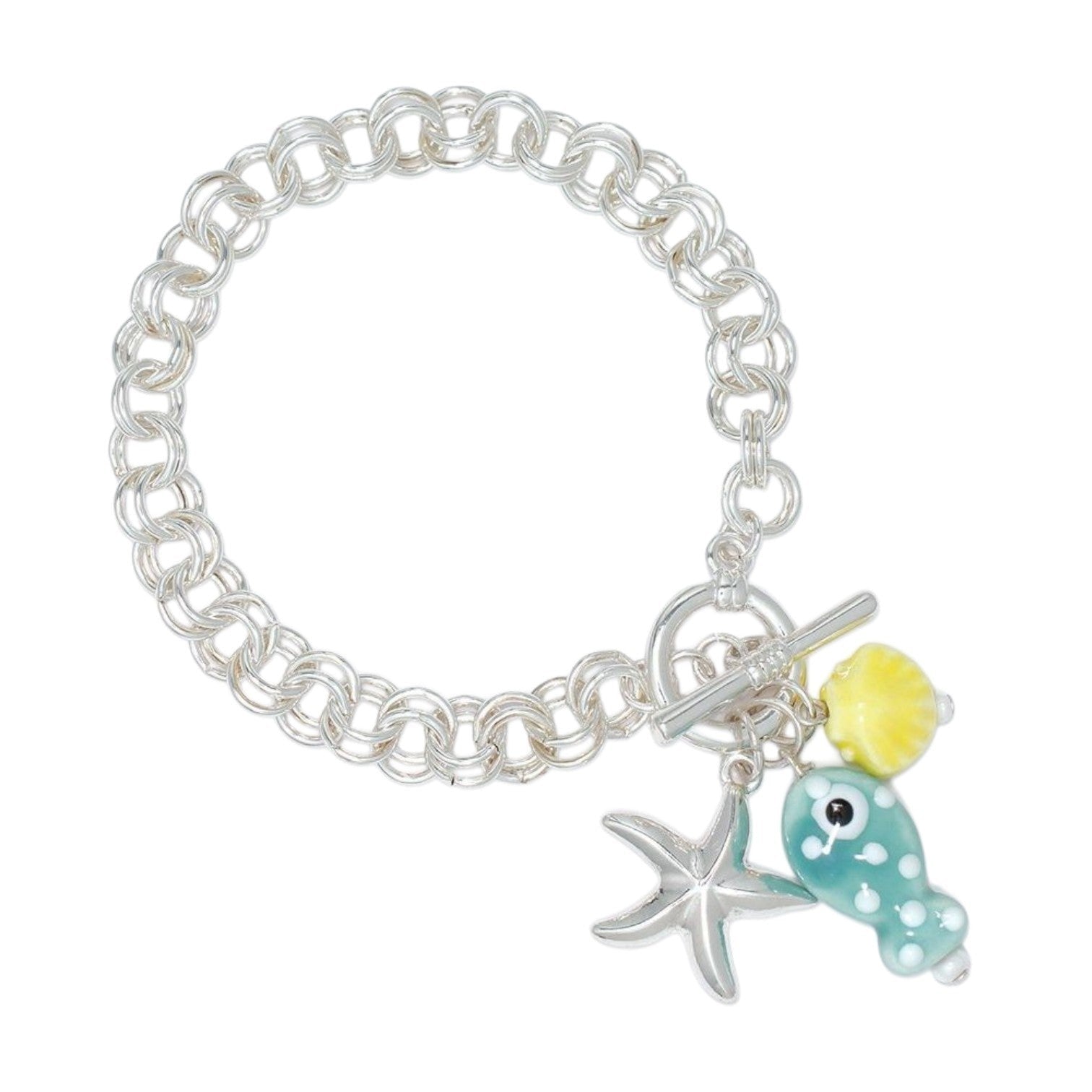 Mellow Monkey silver chain bracelet featuring a mint polka dot fish, starfish, and yellow shell charm.