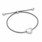 Mellow Monkey slate blue cord bracelet featuring a polished silver heart charm and adjustable sliding beads.