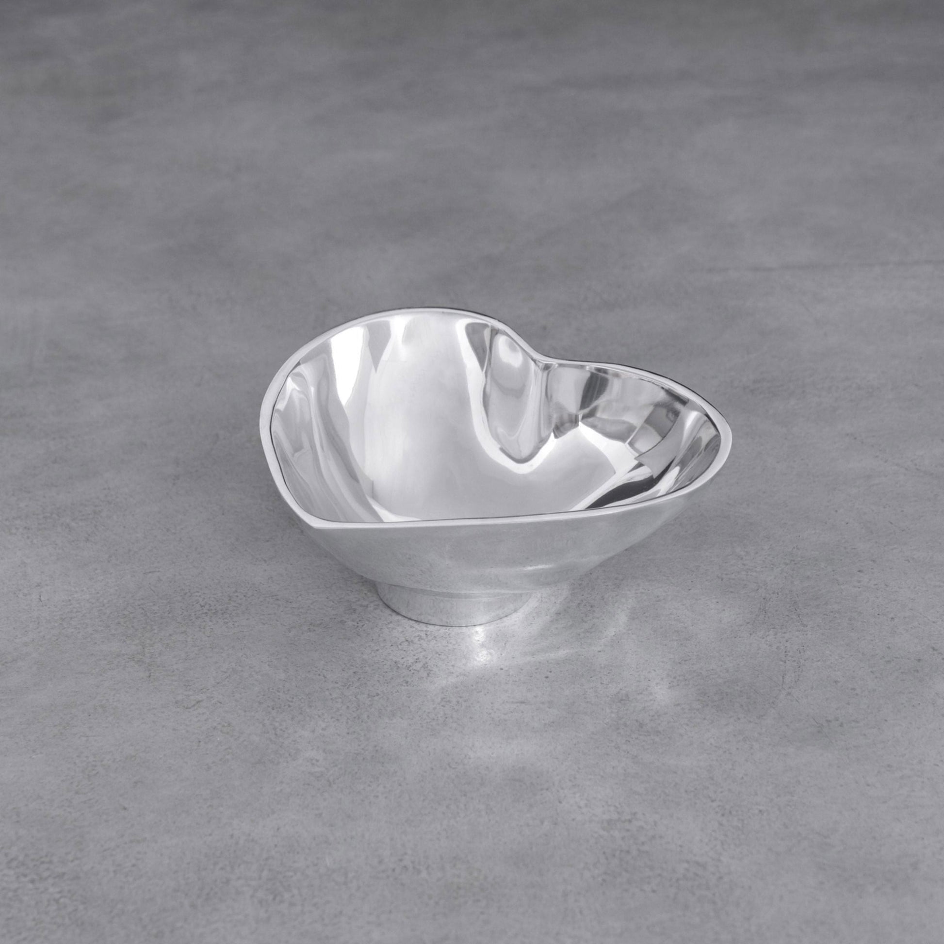 Mellow Monkey GIFTABLES Deep Heart Small Bowl in silver, made of aluminum alloy. Perfect for nuts, dips, and snacks.
