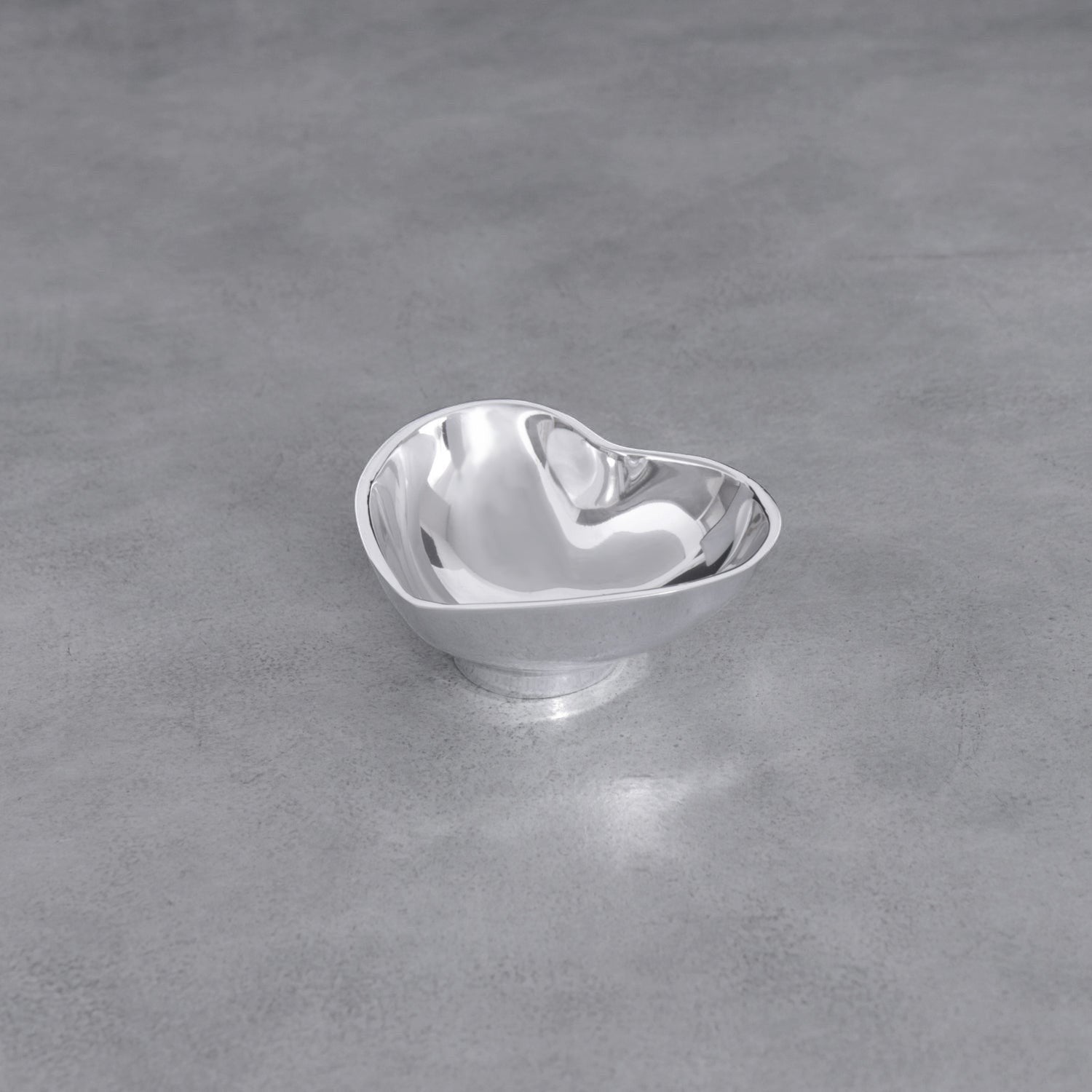 Mellow Monkey silver heart-shaped mini bowl made of aluminum alloy, perfect for serving snacks or holding jewelry.