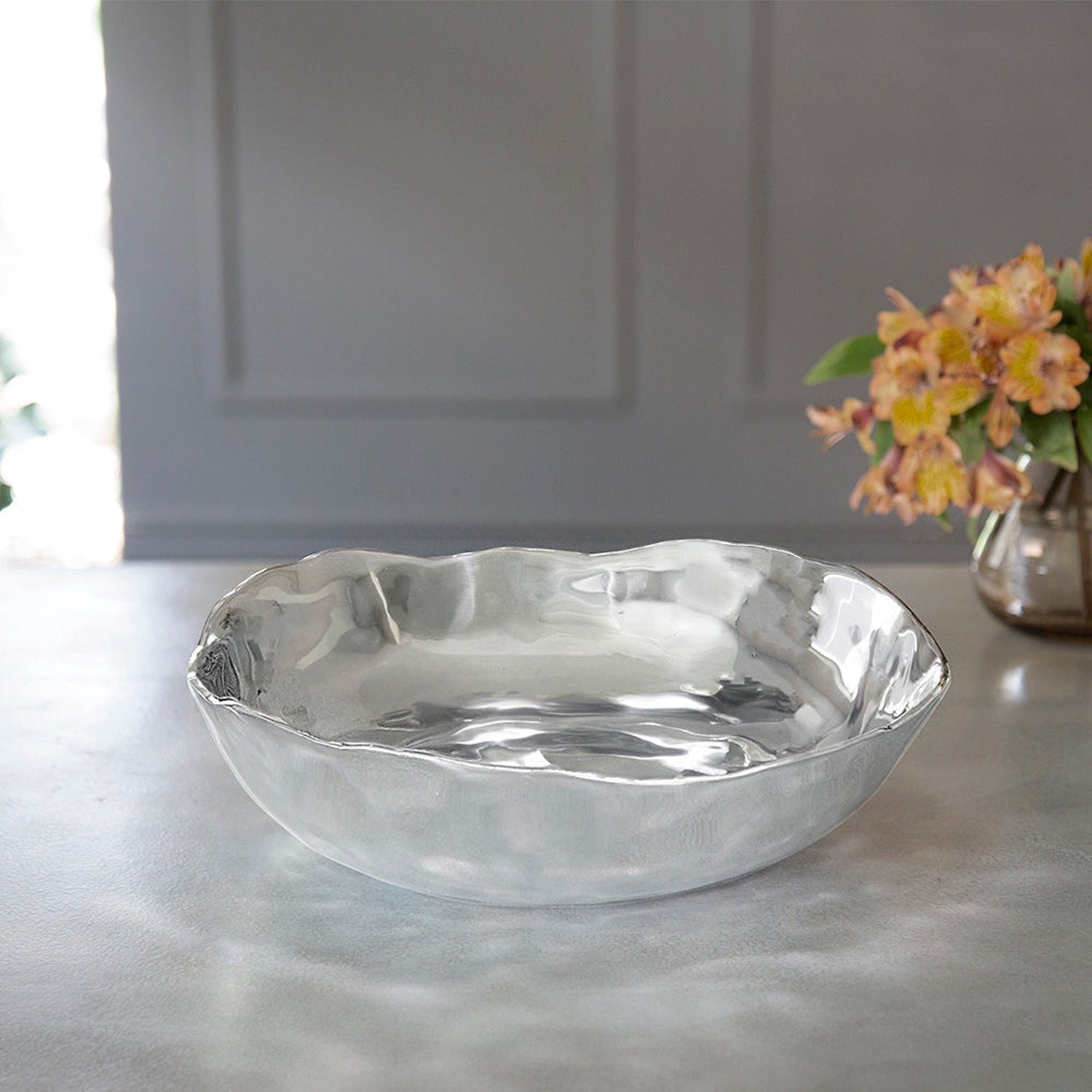 Mellow Monkey SOHO Osaka large silver aluminum alloy bowl with wavy rim, perfect for salads or as a centerpiece.