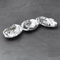 Mellow Monkey OCEAN Oyster Triple Dip serving dish in silver, shaped like three linked oyster shells with intricate detailing.