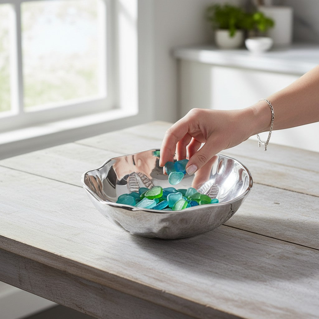 Mellow Monkey OCEAN Sand Dollar Small Bowl in silver aluminum, 5-inch, with a sand dollar design. Ideal for snacks or coastal decor.