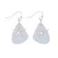 Mellow Monkey silver starfish and light blue sea glass drop earrings for a coastal beachy look.