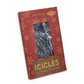Mellow Monkey silver tinsel icicle strands in a decorative red holiday box with snowflake patterns