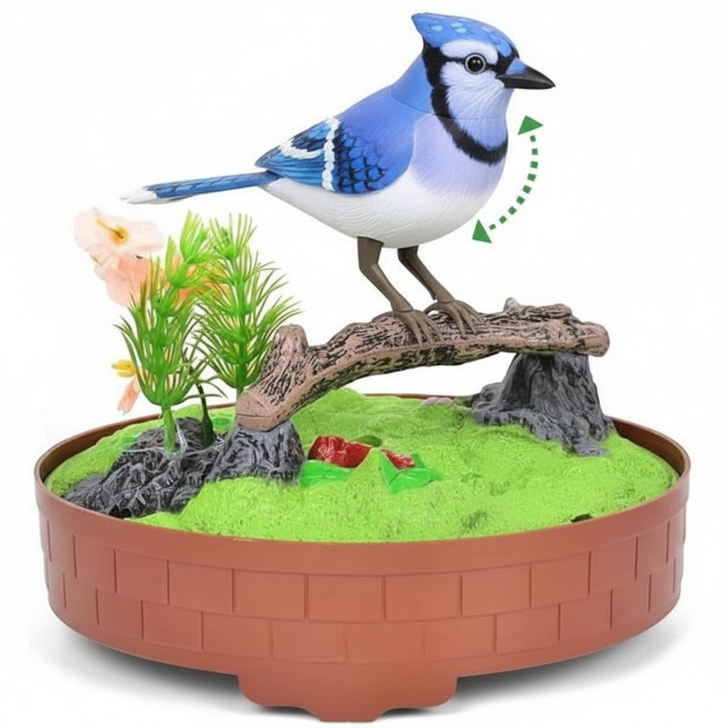 Mellow Monkey motion-activated blue and white singing bird toy perched on a branch with faux greenery in a brown base.