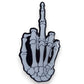 Mellow Monkey skeleton hand middle finger enamel pin with a glossy finish and glow-in-the-dark effect.