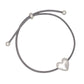 Mellow Monkey slate blue cord bracelet featuring a polished silver heart charm, nickel and lead-free coastal jewelry.