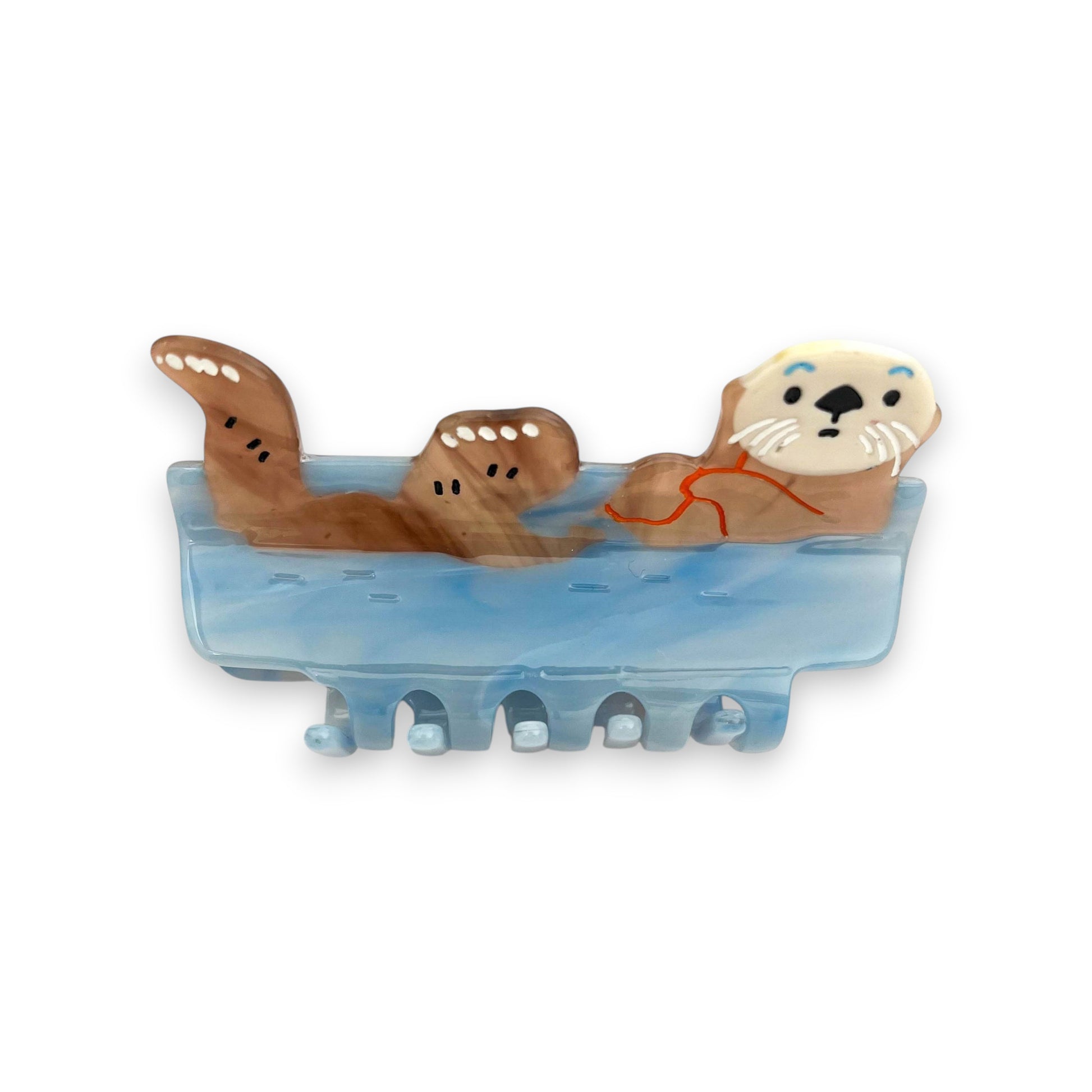 Mellow Monkey blue sleeping otter hair claw clip with a cute curled-up animal design for a playful hairstyle.