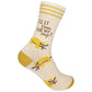 Mellow Monkey pale yellow crew socks featuring sloth illustrations and the text Is It Time For My Nap?