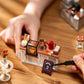 Mellow Monkey Slow Life Café DIY miniature house kit with tiny coffee shop counter, pastries, and accessories.