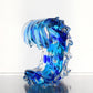 Mellow Monkey Small Sized Wave glass sculpture featuring swirling blue and clear ocean wave design for coastal decor.