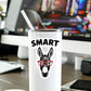 Mellow Monkey Smart Ass vinyl sticker featuring a donkey wearing red glasses on a white tumbler on a desk