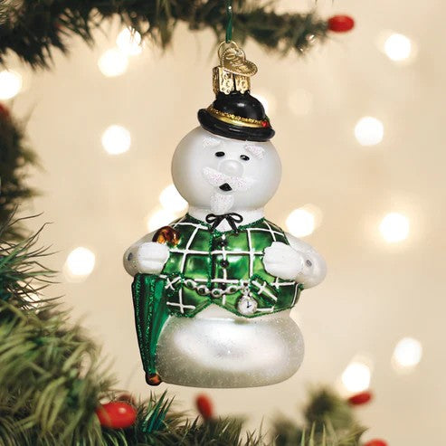 Mellow Monkey Sam The Snowman Old World Christmas blown glass ornament with green plaid vest and umbrella.