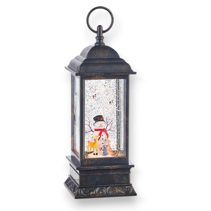 Mellow Monkey 11-inch musical Christmas water lantern featuring a snowman, deer, and swirling glitter in a black frame.