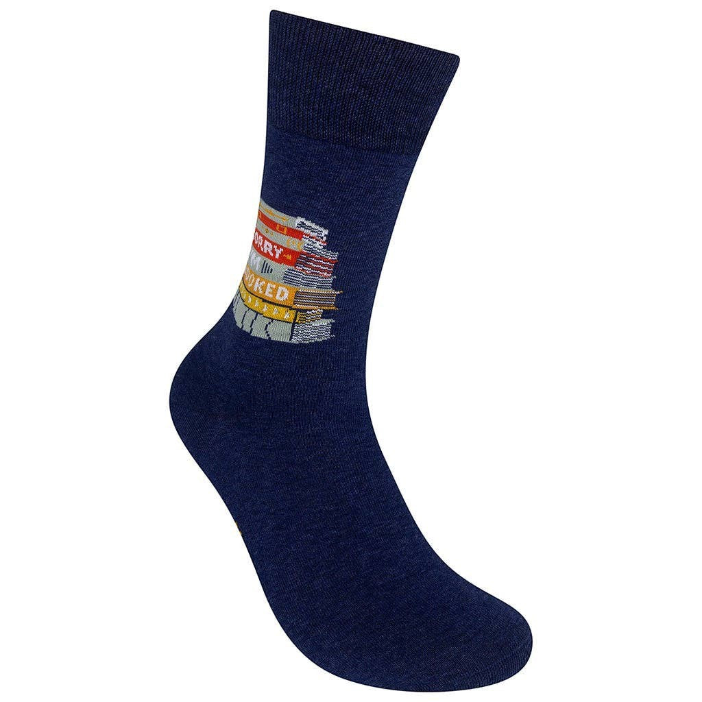 Mellow Monkey navy blue cotton blend socks featuring a colorful stack of books with the text Sorry I'm Booked