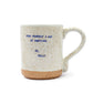 Mellow Monkey handmade speckled ceramic mug with blue text reading Pour yourself a cup of ambition and XO Dolly