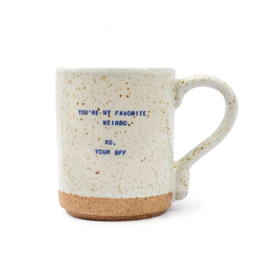 Mellow Monkey handmade ceramic mug with speckled cream glaze and You're My Favorite Weirdo quote in blue text