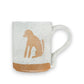 Mellow Monkey speckled stoneware mug featuring a hand-carved dog silhouette design on a cream-colored ceramic base.