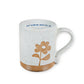 Mellow Monkey speckled stoneware mug with a hand-carved flower design and Keep Blooming Beautiful One quote inside.