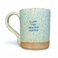 Mellow Monkey speckled stoneware mug with I Love You More Than Coffee quote in blue text on a cream base.
