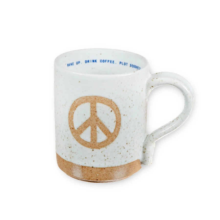 Mellow Monkey speckled stoneware mug featuring a hand-carved peace sign and an interior quote about plotting goodness.