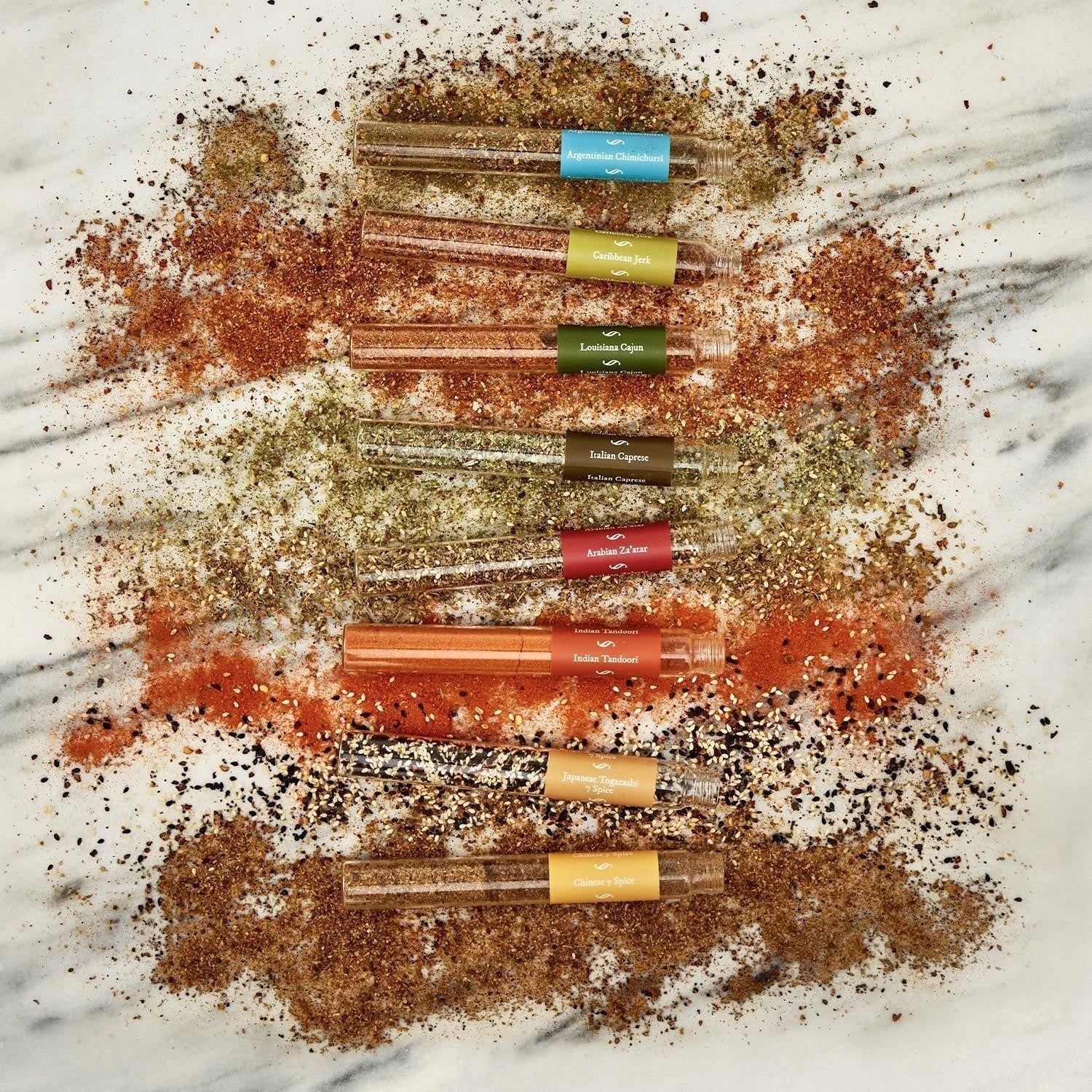 Mellow Monkey Spice Route 8-tube gourmet spice gift set with Argentinian Chimichurri, Caribbean Jerk, Louisiana Cajun, Italian Caprese, Arabian Za'atar, Indian Tandoori, Chinese 5 Spice, and Japanese Togarashi.