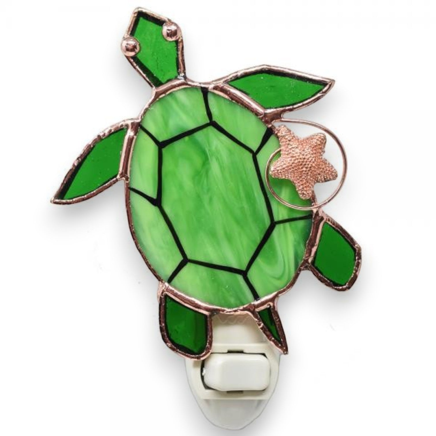 Mellow Monkey stained glass sea turtle nightlight with green glass, copper electroplate finish, and a small starfish.