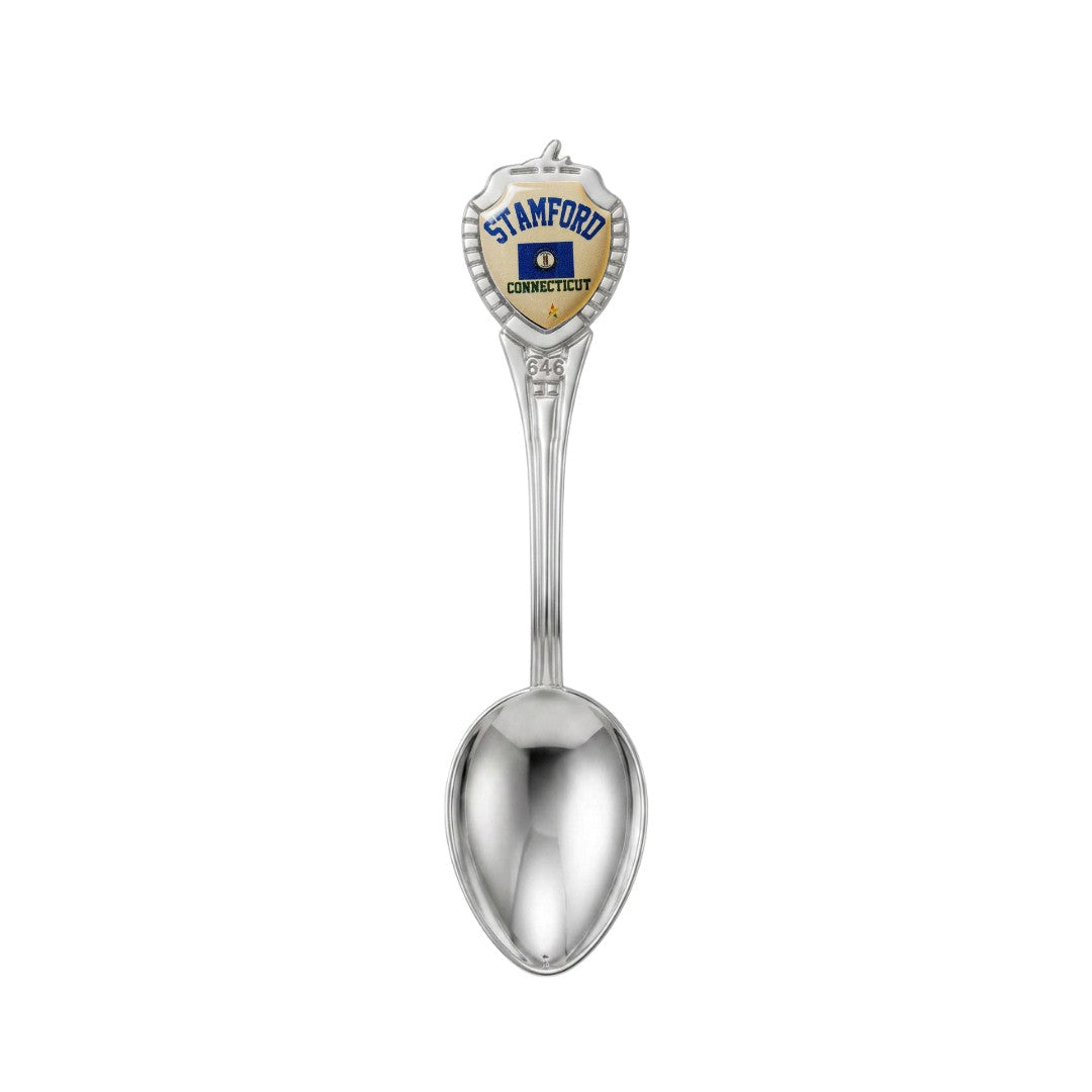 Mellow Monkey silver-tone Stamford Connecticut souvenir spoon with a decorative handle and colorful emblem