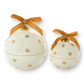 Mellow Monkey star-studded ornament candles in white glass with gold stars and velvet ribbon bows
