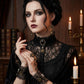 Model wearing Mellow Monkey steampunk gear jewelry set with necklace, earrings, and bracelet in a gothic setting.